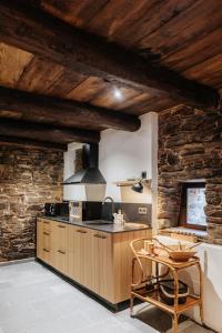 Kuchyň nebo kuchyňský kout v ubytování Casa do Corral