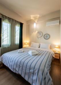 Posteľ alebo postele v izbe v ubytovaní Stagiates Guest House at Pelion + 37 fotografií