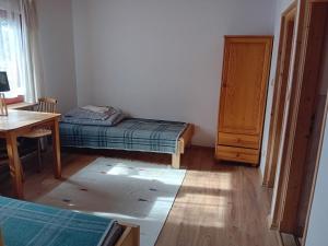 Posteľ alebo postele v izbe v ubytovaní Pokoje Gościnne Za Sichłą