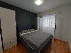 Postel nebo postele na pokoji v ubytování Apartment Matea