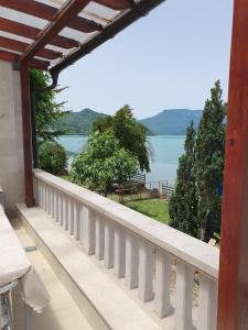a balcony with a view of the water at Apartman Relax Čelebići in Konjic
