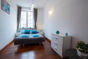 Postel nebo postele na pokoji v ubytování BaySide Apartments MainCity