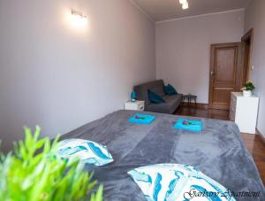 Postel nebo postele na pokoji v ubytování BaySide Apartments MainCity