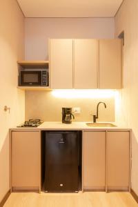 Kuchyň nebo kuchyňský kout v ubytování Hotel Lincoln