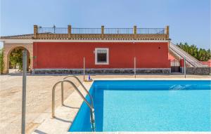 Piscina de la sau aproape de 3 Bedroom Lovely Home In Olivares
