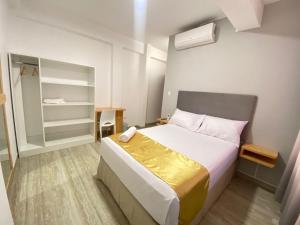Postel nebo postele na pokoji v ubytování Bendezu Hotel