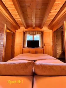 Postel nebo postele na pokoji v ubytování Alpenburg Bergparadies Apartments