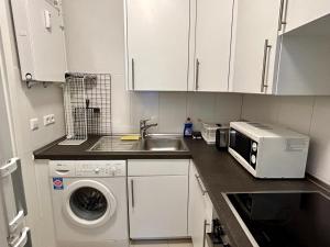 Η κουζίνα ή μικρή κουζίνα στο Gemütliche zentralgelegene 2 Zimmer Wohnung in Hamburg