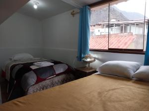 Postel nebo postele na pokoji v ubytování Casa D´Maria