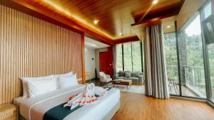 Damar Langit Resort房間的床