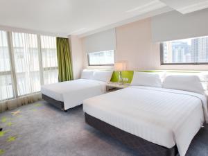 Cama o camas de una habitación en Dorsett Tsuen Wan, Hong Kong