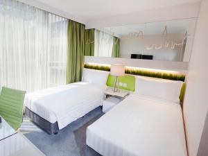 Cama o camas de una habitación en Dorsett Tsuen Wan, Hong Kong