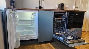Kuchyň nebo kuchyňský kout v ubytování Kviholmi Premium Apartments + 8 fotografií