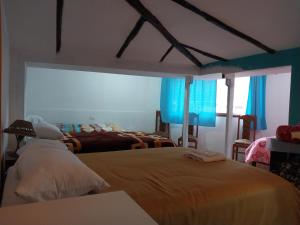 Postel nebo postele na pokoji v ubytování Casa D´Maria