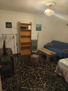 Posezení v ubytování Habitaciones cómodas