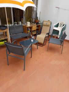 Posezení v ubytování Habitaciones cómodas