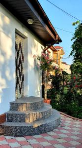 a set of stairs in front of a house at Casa Eduard in Eforie Sud
