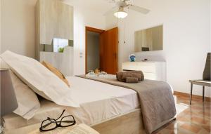 A bed or beds in a room at Villa Natalia