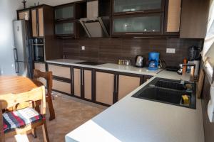Kuchyň nebo kuchyňský kout v ubytování Serenity house