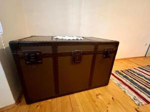 a black suitcase sitting on the floor in a room at Vila Klara in Olib