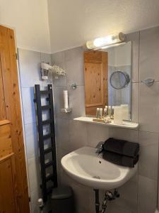 Koupelna v ubytování Comfort Hotel Garni Landhaus Gitti