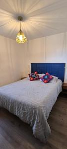 Postel nebo postele na pokoji v ubytování Flying Dog Hostel Cusco
