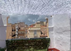 a view of a city from a window of a building at Plaça de l'Almudí, where else! in Onda