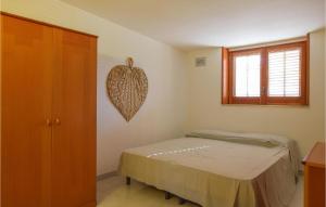 Posteľ alebo postele v izbe v ubytovaní Awesome Apartment In Alcamo Marina