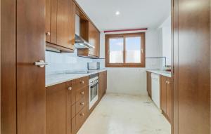 A kitchen or kitchenette at Cozy Apartment In Torrevieja