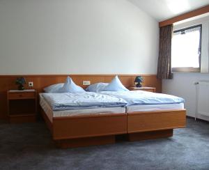 En eller flere senge i et værelse på Landgasthof Dockemeyer