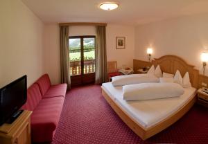Voodi või voodid majutusasutuse Hotel Bad Winkel toas