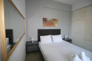 En eller flere senger på et rom på Quality Suite, Tranquility, Sea Views, Breeze