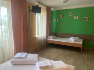 Posteľ alebo postele v izbe v ubytovaní Hostel Podolski Plus