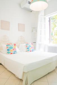 Postel nebo postele na pokoji v ubytování Hotel La Pineta Al Mare