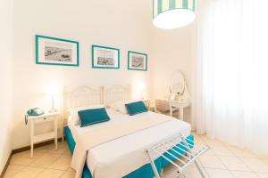 Postel nebo postele na pokoji v ubytování Hotel La Pineta Al Mare