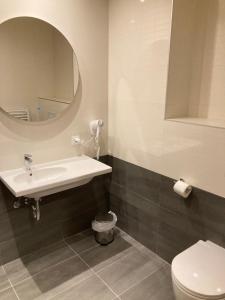 Koupelna v ubytování Apartment 333 Aparthotel Vučko Jahorina private host + 9 fotografií