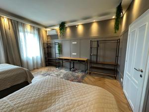 Łóżko lub łóżka w pokoju w obiekcie Book-A-Room Salzburg Apartment 33