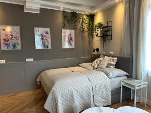Łóżko lub łóżka w pokoju w obiekcie Book-A-Room Salzburg Apartment 33