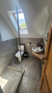 Koupelna v ubytování Hámor Panzió