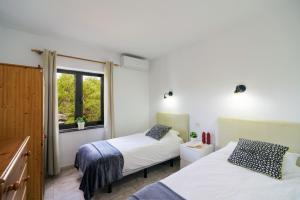 Postel nebo postele na pokoji v ubytování Villa Cielos by Villa Plus + 15 fotografií