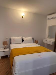 Postel nebo postele na pokoji v ubytování Treva Hotel & Apartaments