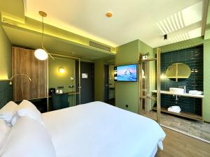 Postel nebo postele na pokoji v ubytování Design Hotel & Private Spa - Tbilisi Edition