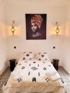 Postel nebo postele na pokoji v ubytování Riad TOURIA + 37 fotografií