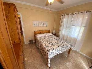 Postel nebo postele na pokoji v ubytování Paradise Villa