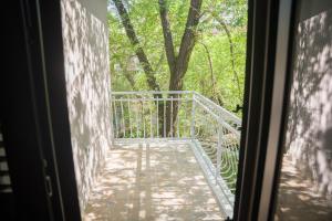 a view of a walkway from a door at Apartman Vito in Drniš +17 photos