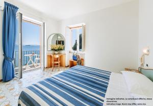Postel nebo postele na pokoji v ubytování Hotel Bagnitiello