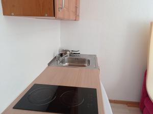 Η κουζίνα ή μικρή κουζίνα στο Ocean & Beach