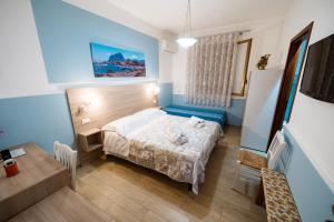 Posteľ alebo postele v izbe v ubytovaní B&B Profumi di Sicilia