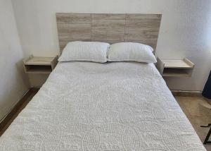 Voodi või voodid majutusasutuse Casa céntrica, en privada con acceso controlado toas