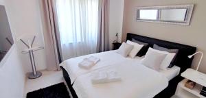 Postel nebo postele na pokoji v ubytování Apartment Antinous Split